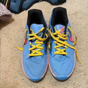 Nike Men’s Blue Basketball shoes with Pink Accents